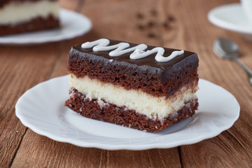 Delicious dessert cake with  cream and coffee
