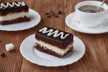 Delicious dessert cake with  cream and coffee