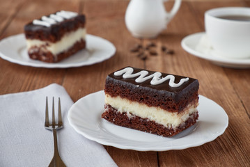 Delicious dessert cake with  cream and coffee