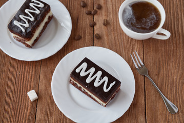 Delicious dessert cake with  cream and coffee