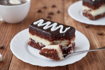 Delicious dessert cake with  cream and coffee