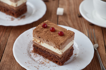 Delicious dessert cake with  cream and coffee