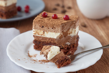 Delicious dessert cake with  cream and coffee