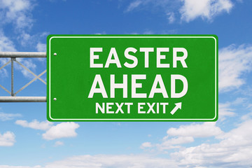 Road sign with Easter Ahead text