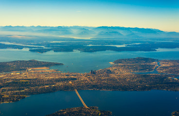 Aerial view of Seattle, Washington, Puget Sound, and the Olympic Mountains - obrazy, fototapety, plakaty