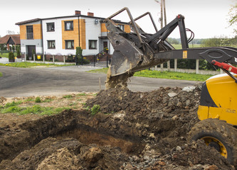 digging and leveling the bottom of the backyard septic tank