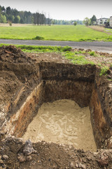 digging and leveling the bottom of the backyard septic tank