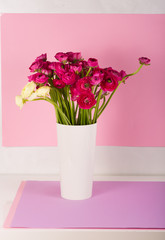 Beautiful bouquet of ranunculuses in a vase