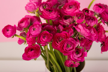 Beautiful bouquet of ranunculuses in a vase