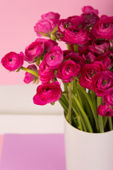 Beautiful bouquet of ranunculuses in a vase