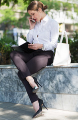 Business woman working outdoors