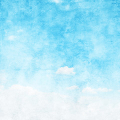 Blue sky with clouds in grunge style.