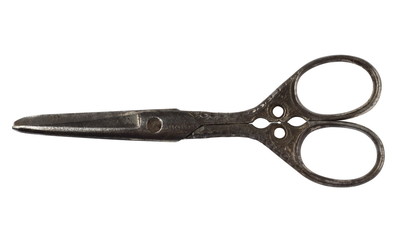 Antique scissors isolated on white