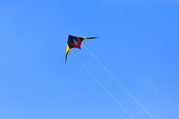 kite flying in blue sky