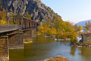 Appalachian trail crossing Shenandoah River in Harpers Ferry. Colorful autumn landscape from a scenic outlook in West Virginia, USA.