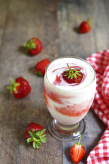 Vanilla milkshake with strawberry.