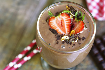 Chocolate banana smoothie with strawberry.