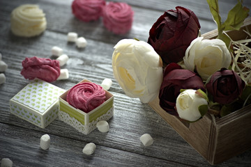 Red and white buttercup flowers ranunculus white and pink zephyr marshmallows with little cardboard...
