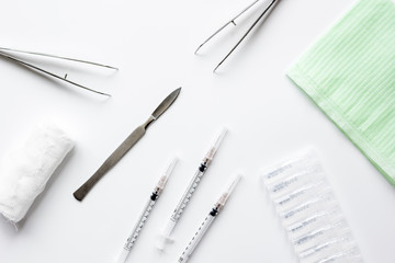 instruments of gynecologist on white background top view mock up