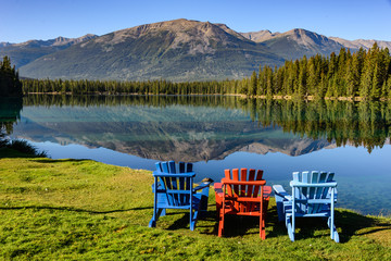 Three Adirondack Chairs