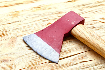 ax on a wooden background
