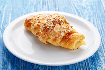 croissant with almonds breakfast