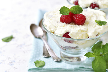 Traditional english dessert eton mess with fresh raspberry.