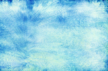 Blue empty school chalkboard textured background.