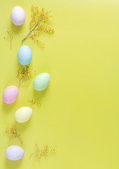 Easter concept on yellow background top view mockup