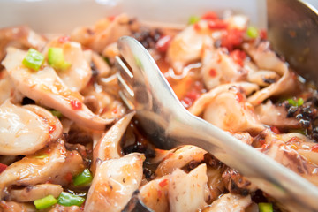 Salad of squid and scallops .
