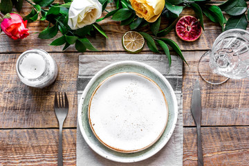 ceramic tableware top view on wooden background mock up