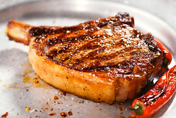 food meat - beef steak on vintage metal plate