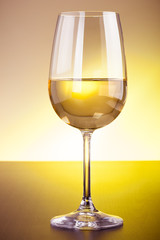 White wine glass on table