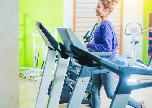 Woman on Fitness Treadmill