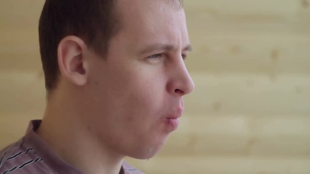 young man eating pizza. mmm tasty)