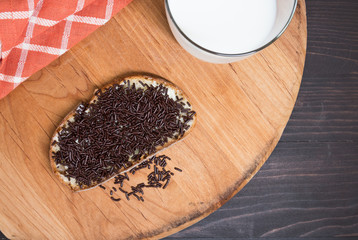 Chocolate Sprinkles on Wood with Milk