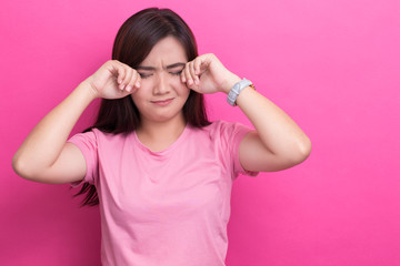 Fototapeta premium Crying woman on isolated background