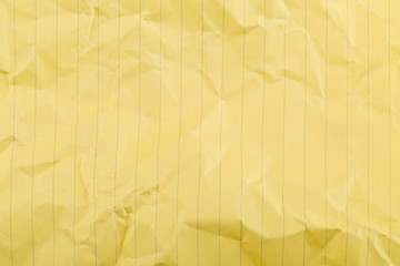 Crumbled yellow lined, clean paper texture