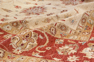 Close up of a handmade afghan Chobi oriental carpet