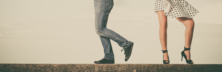 Loving couple playing on date by sea coast