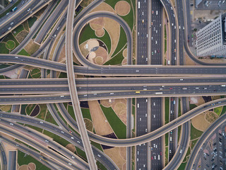 aerial view of road junction with railway tracks in Dubai, UAE