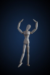 Wooden figurine rising arms in elegant dancing move on dark background