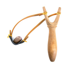 catapult or slingshot with pebble isolated on white background.catapult isolated