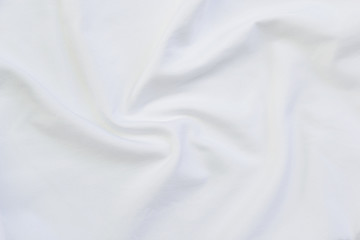 Fototapeta na wymiar Close up of white bedding sheets with copy-space