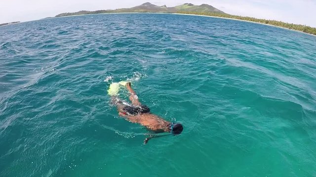 FJ 132 Indigenous Fijian man snorkel in the Yasawa Islands of Fiji