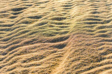 White and yellow sand in the desert beach