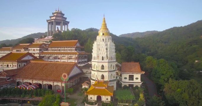 White Pagoda in Kek Lok Si Temple, Penang, Malaysia, Wraparound Aerial Shot

