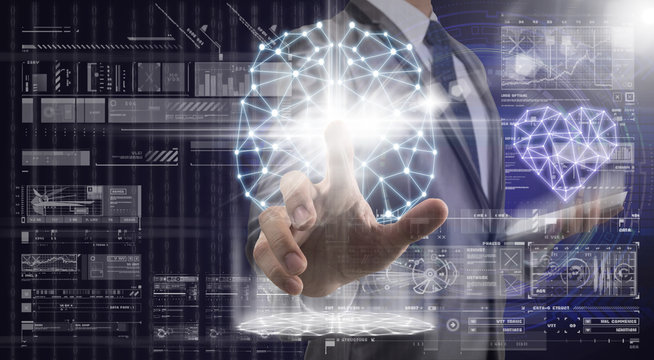Businessman hand touching the polygonal brain shape digital virtual screen over the Network connection line between building of cityscape background, business innovation concept - Powered by Adobe