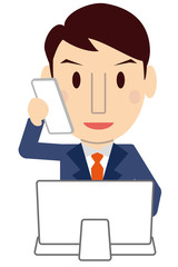 かわいい若いビジネスマン　真面目　ブルーのスーツ　パソコン