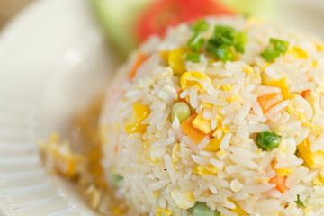 closeup vegetable egg fried rice food in restaurant.